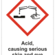 Značení nebezpečných látek a obalů - Symboly GHS s textem: "Acid, causing serious skin and eye damage"