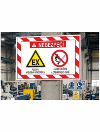 Warning sign in a factory: explosive atmosphere and no smoking or open flames (Czech: Nebezpečí)."],